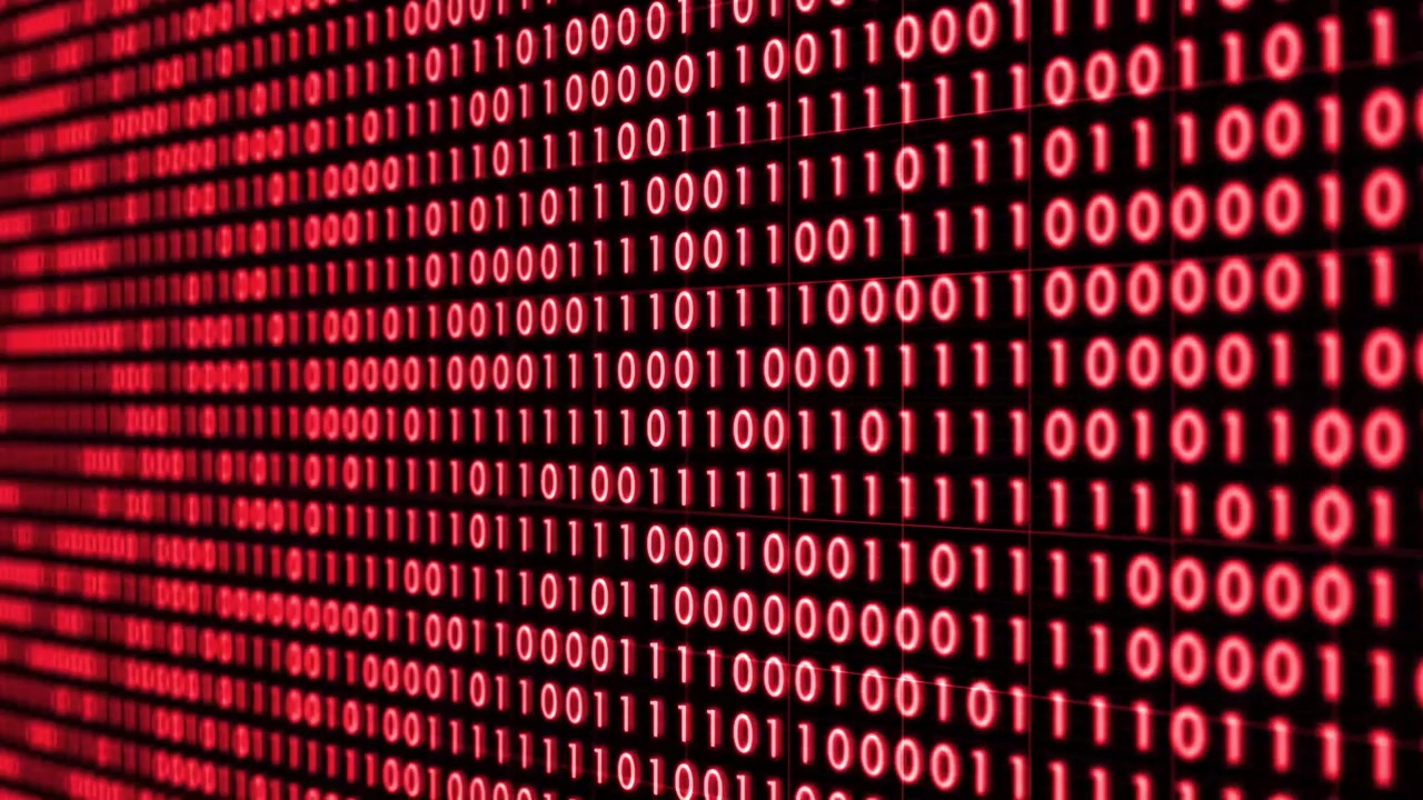 Diagonally moving rows of dense red binary code, consisting of 1s and 0s, represent the fundamental data structure of digital communication and computer systems.