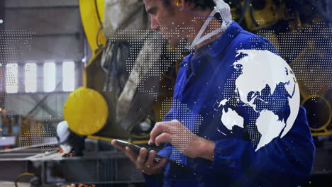 animation of world map over caucasian male worker using tablet