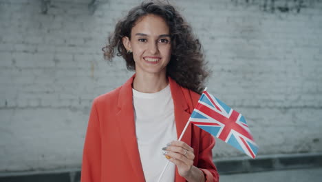 woman holding british flag