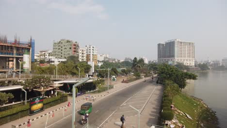 cityscape view with lake and road