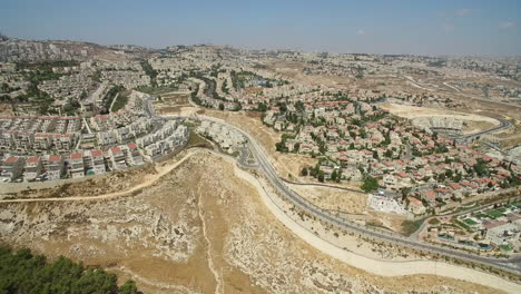 aerial view of a residential city sprawling across hills