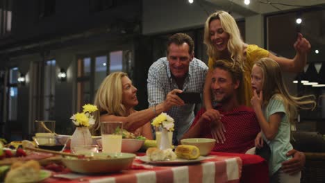 Happy-family-eating-dinner-together.