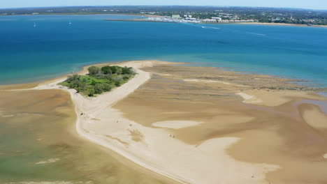 Tropical-Sand-Island-In-Blue-Turquoise-Bay,-Aerial-4K-Flyover,-Australia