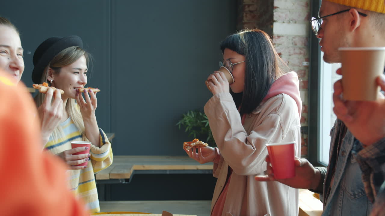 Friends Enjoying Pizza and Coffee