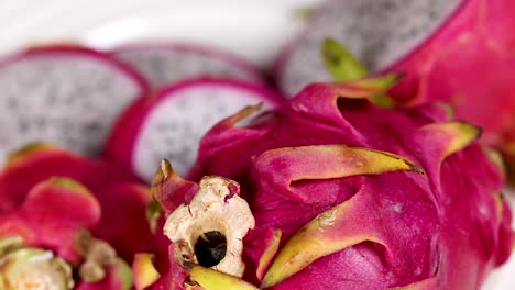 vibrant dragon fruit slices arranged on a plate