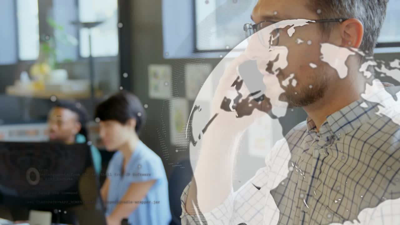 Male office pro lifting smartphone to ear and coordinating global tech call with globe overlay