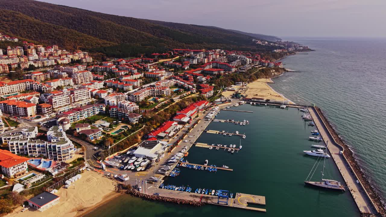 Stunning aerial view of seaside resort in Bulgaria with boats and homes