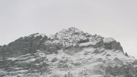 Drone-Aerial-view-of-the-snowy-Grindelwald-and-the-Eiger-in-the-beautiful-swiss-mountain-landscape