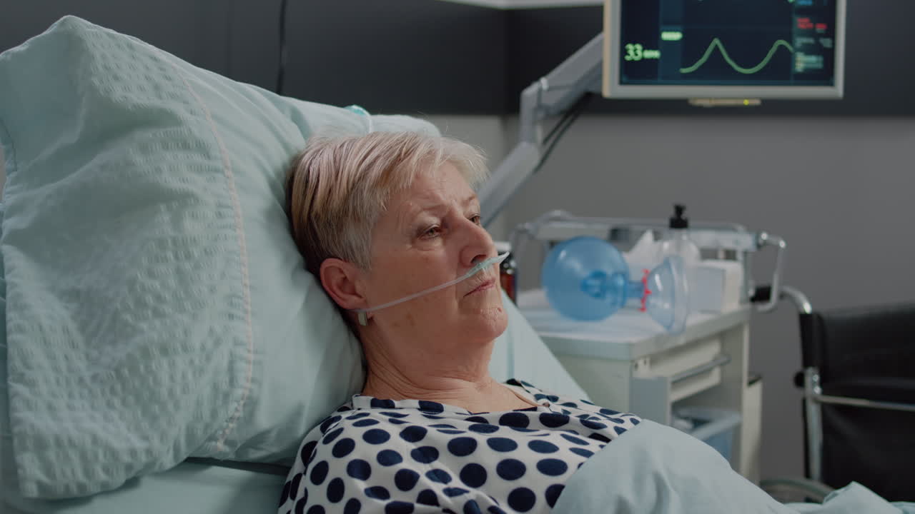Portrait of retired woman with sickness laying in bed