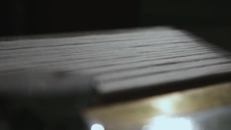 processing cotton thread from yarn on a spinning machine, industrial machine
