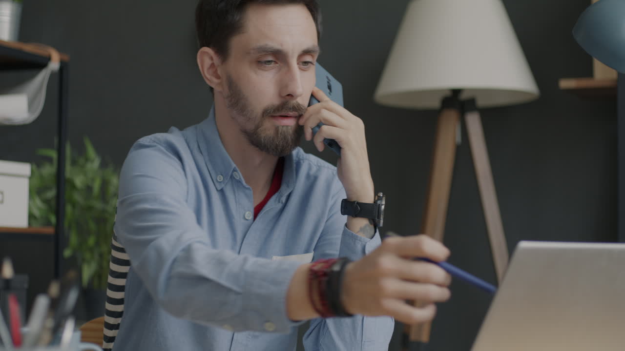 Man on Phone Call in Office