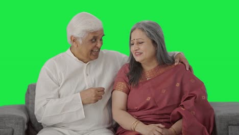 Happy-Indian-old-couple-talking-to-each-other-Green-screen