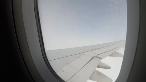 Airplane-going-directly-into-clouds,-view-from-inside