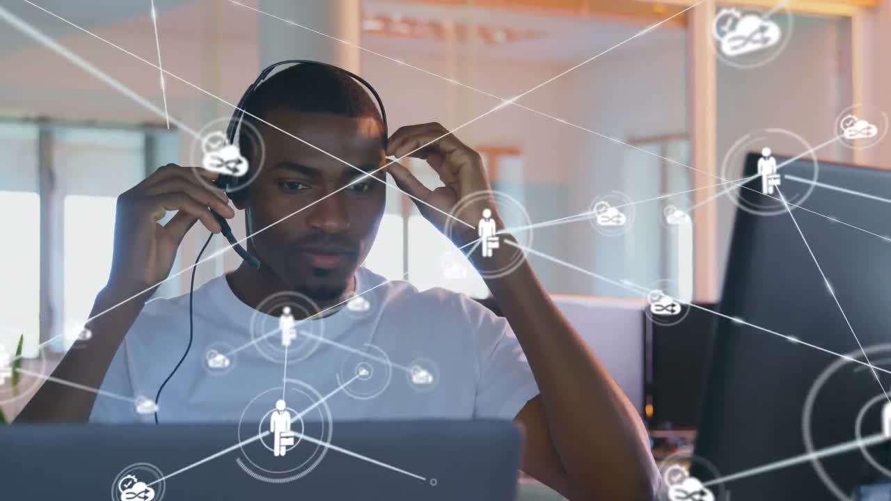 Animation of networks of connections and businessman wearing phone headset