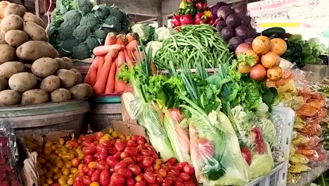 bali traditional market with vegetables seller