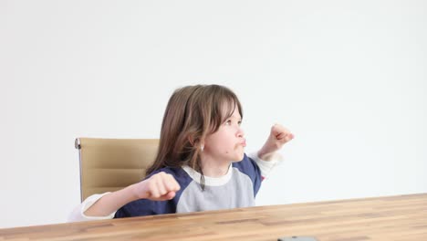 Excited Child Celebrating Success