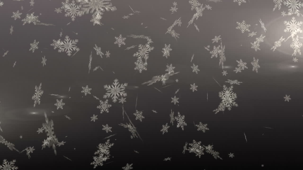 copos de nieve cayendo contra un fondo gris