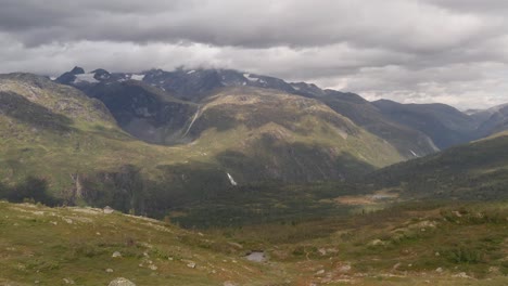 drone shot of norway remote rocky landscape with lakes, forests and rivers