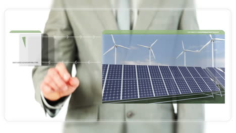 Businessman-dragging-videos-about-renewable-energies