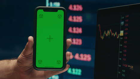 phone smartphone green screen chroma key close-up. bitcoin index, trading stock. connecting with ai and using a chat gpt. it engineer software developer programmer interact with chat bot.