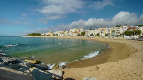 Platja-de-les-Barques-sea-field-Maresme-Barcelona-Mediterranean-coast-plane-close-to-turquoise-blue-transparent-water-beach-without-people