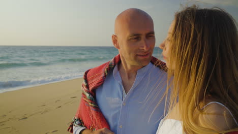 beautiful young couple looking at seaview