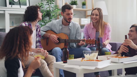 friends enjoying a music session at home