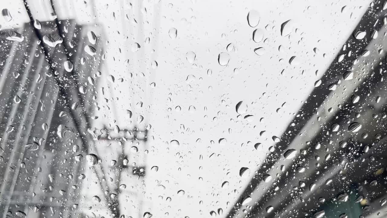 Raindrops are falling on the car.