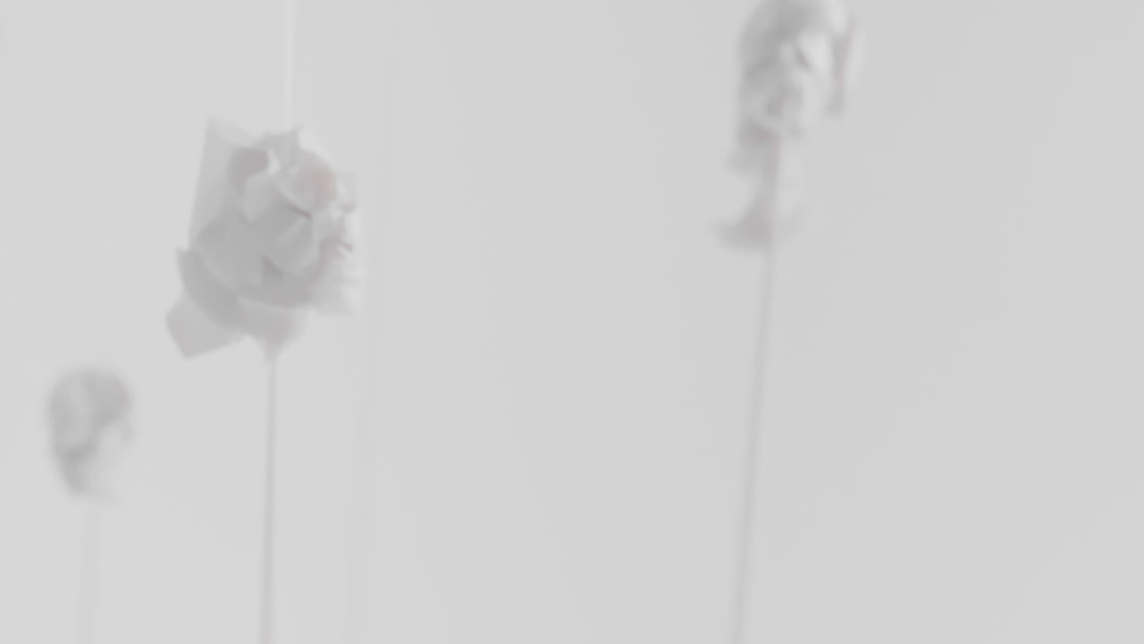 Crushed android heads on spikes in white space