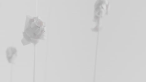 crushed android heads on spikes in white space