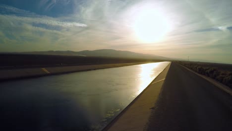 an aerial view over the los angeles aqueduct at sunset