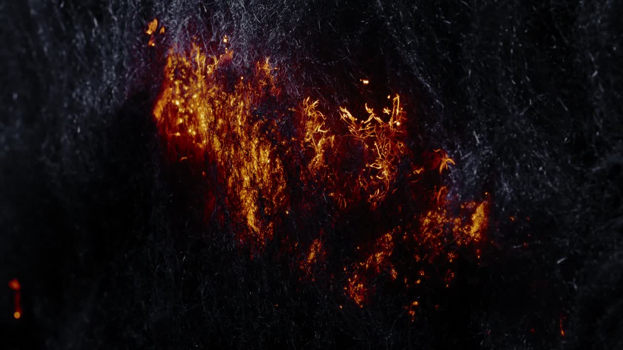 ARTISTIC FIRE TRAILS: A few heat trails rise up from the bottom and then combine into larger clouds of glowing heat, pulsing up from time to time and turning the entire scene into a flaming inferno