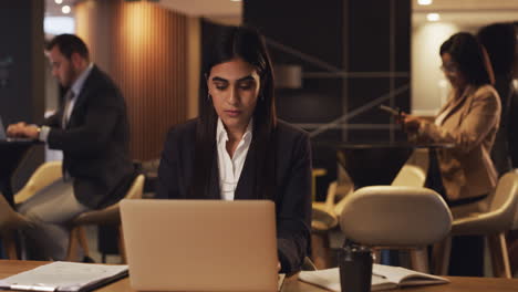 Checking-her-notes-to-ensure-she's-well-prepared