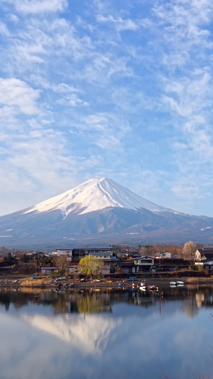 Aerial drone view of a temple with Mount Fuji on the background in Fujikawaguchiko, Japan