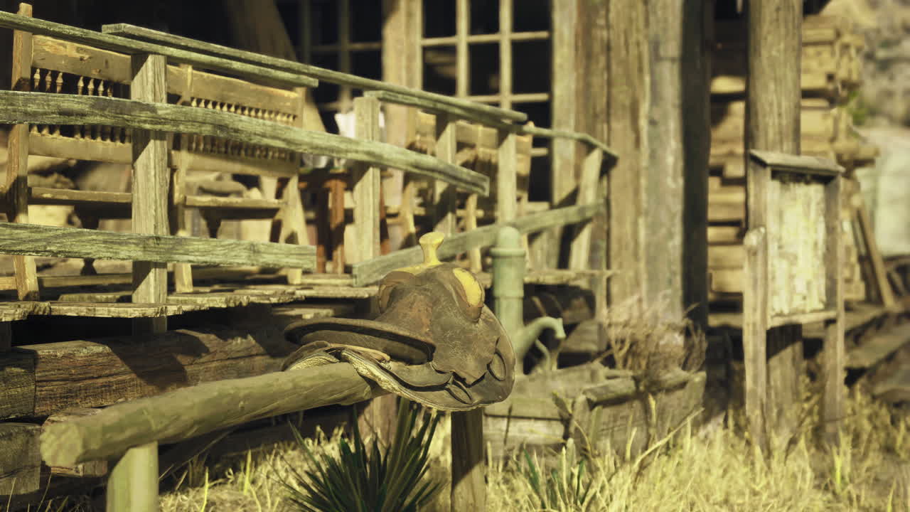 Rustic saddle resting on weathered porch of an old western building