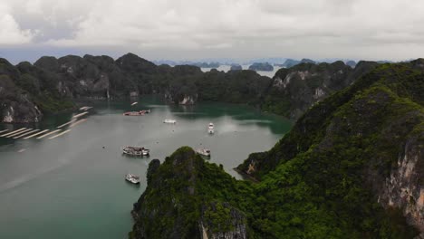 closing in overview clip of cruise ships in halong bay vietnam