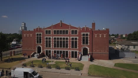 slow-dolly-forward-showing-students-outside-their-campus