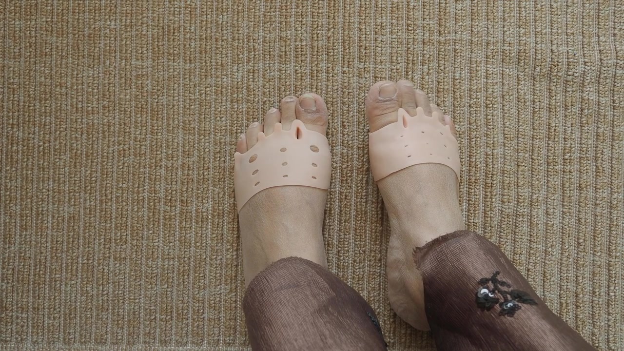 Person Wearing Silicone Toe Separators for Foot Care