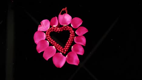 Decoration-heart-shape-against-black-background