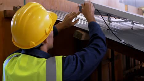 male worker working on solar panel 4k