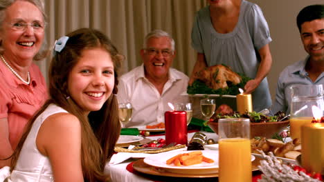 family having christmas dinner at home