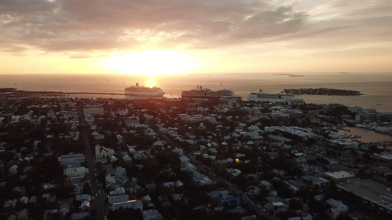 Three cruise ships in port in Key West Florida. Aerial view.