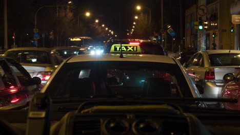 Timelapse-of-car-driving-in-night-city-inside-view