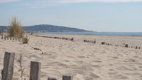 Sandstrandlandschaft-Sete-Holzzaun-Mont-Saint-Clair-Mittelmeer