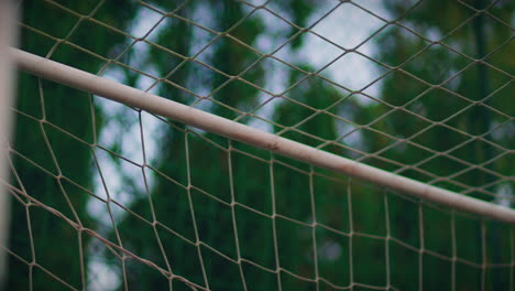 goal-net-and-frame-detail-long-angle-medium-slow-motion-gimbal-shot