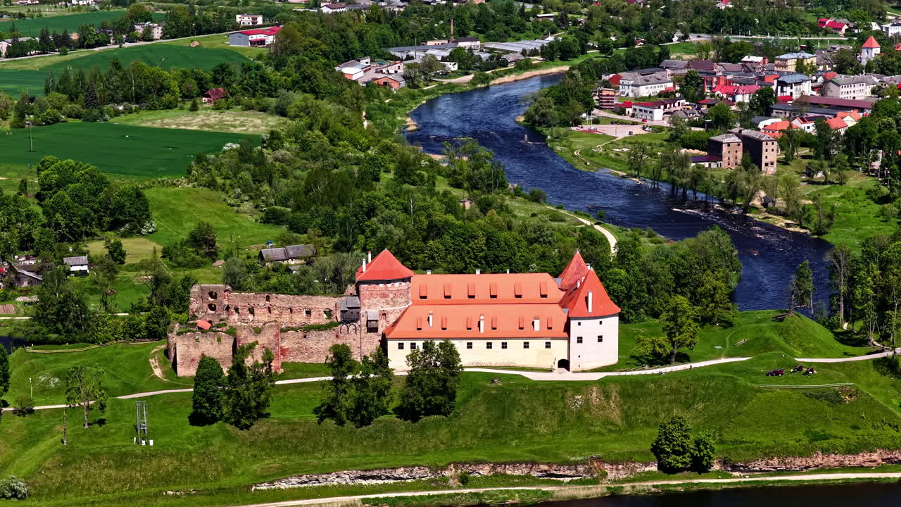 Aerial view of Bauska Castle and surrounding landscape in Latvia