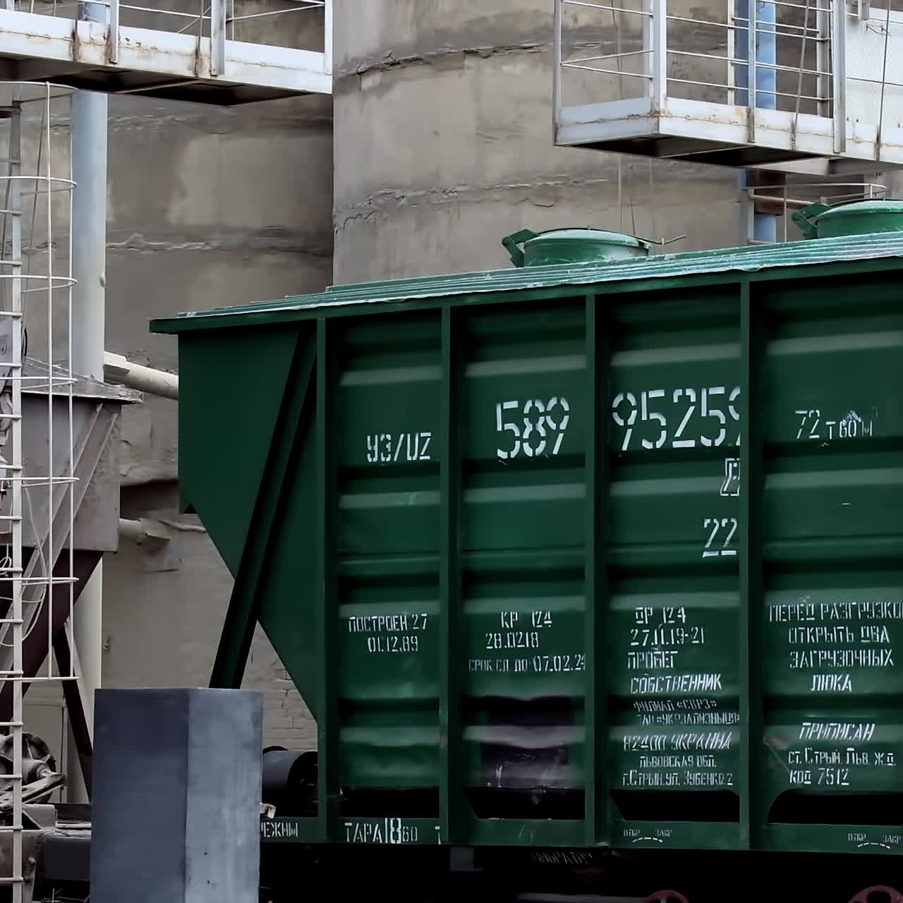 Exterior of concrete plant. Industrial equipment outdoors. Machinery on cement manufacturing factory. Industrial concept. Slow motion camera.