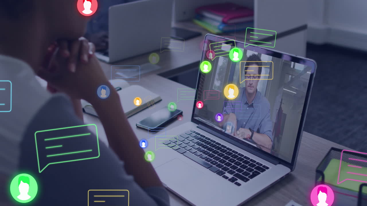 Animation of social media icons over african american woman having video call