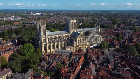 aerial view of york minster towering over medieval streets of york on beautiful sunny day - england