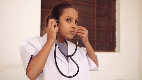 portrait of an indian child at home during coronavirus lockdown